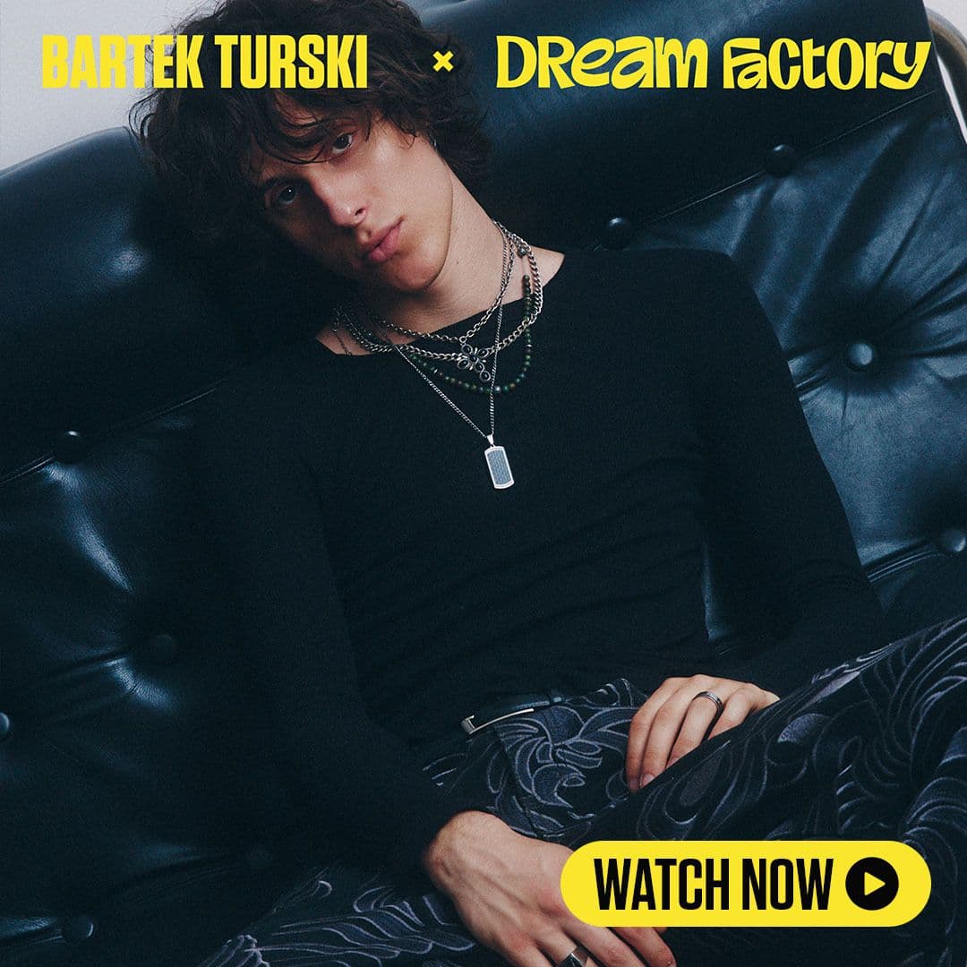 artist Bartek Turski sitting in a sofa. click the image to watch and listen to the content