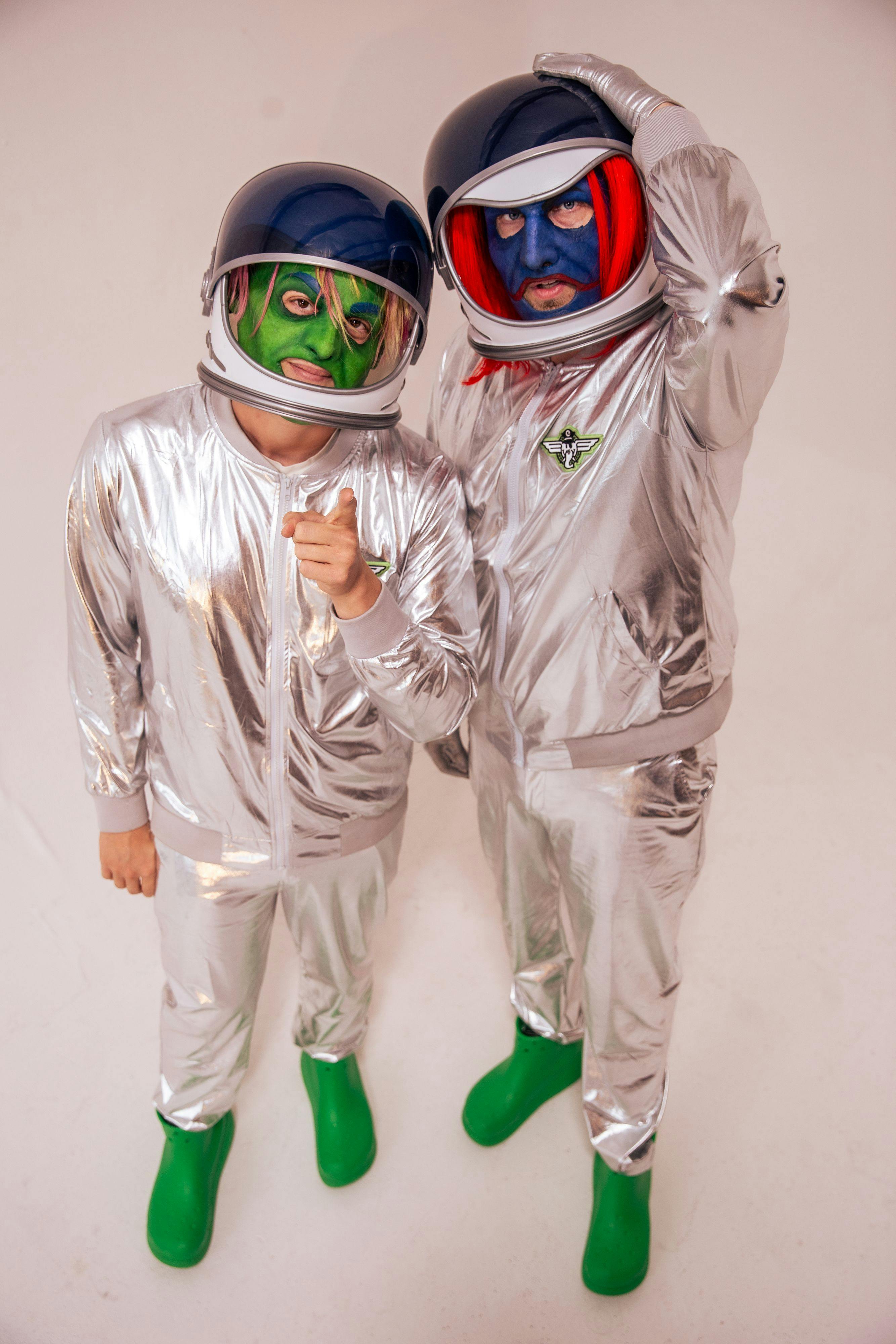 Duo Confetti posing in astronaut suits
